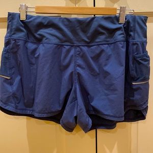 Athleta running/athletic shorts, solid blue, size L